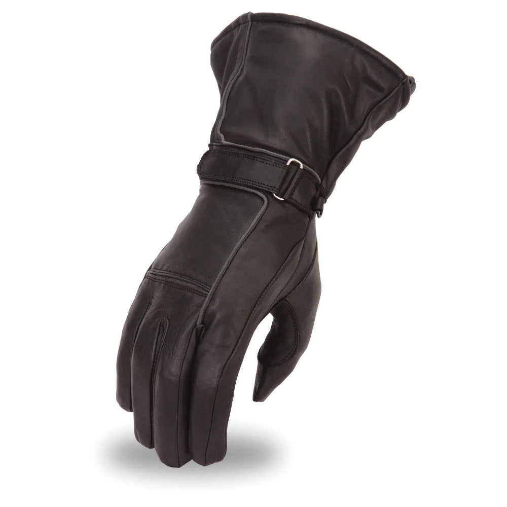 Tarraco Women’s waterproof gauntlet featuring a Hipora rain insert, reflective piping, gel palm, and adjustable wrist strap with draw string cuff seal. Made in premium Aniline cowhide